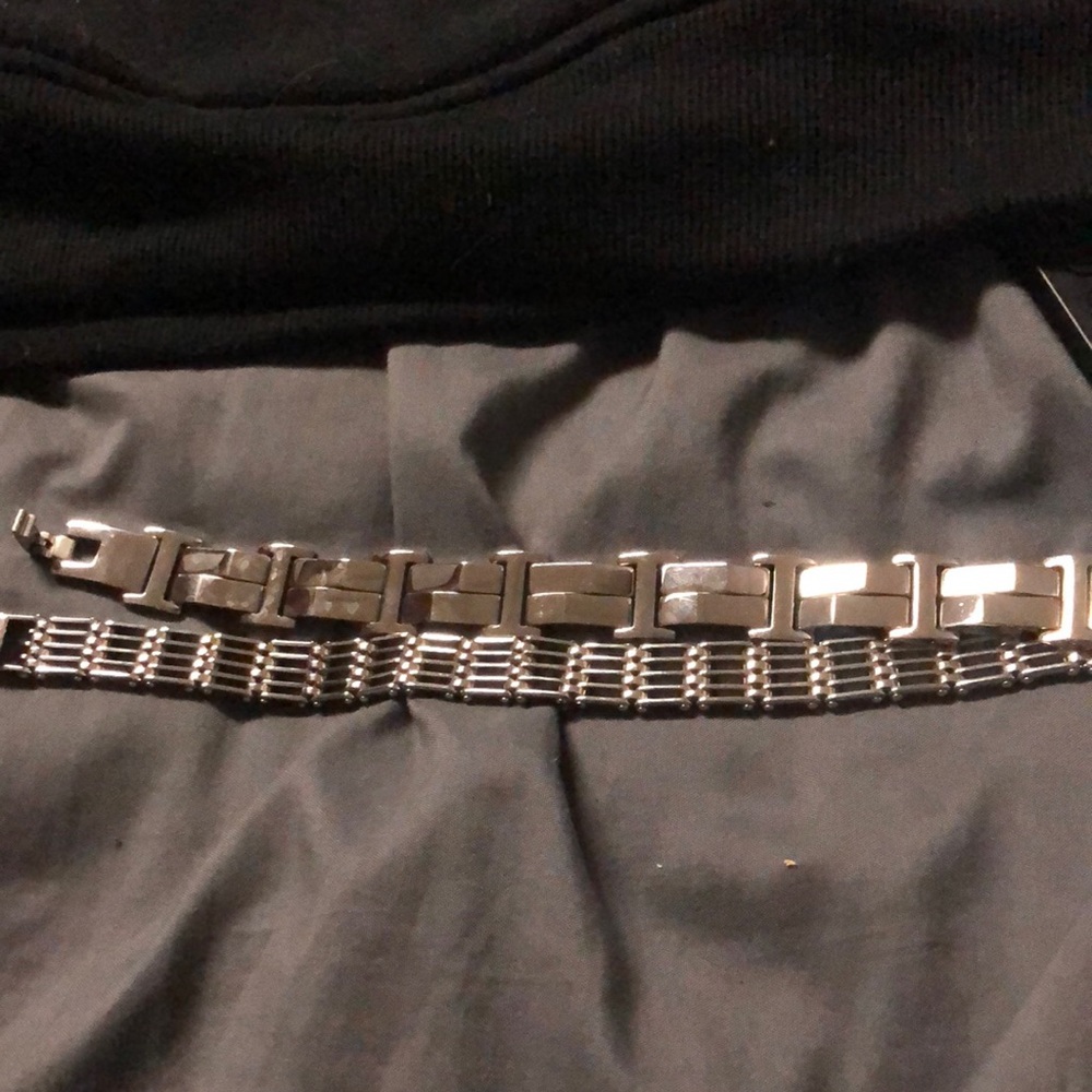 Two silver men’s bracelets